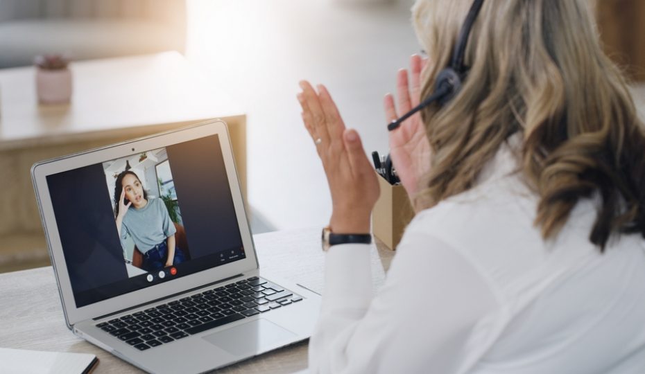 therapist,,person,and,laptop,for,video,call,at,house,for