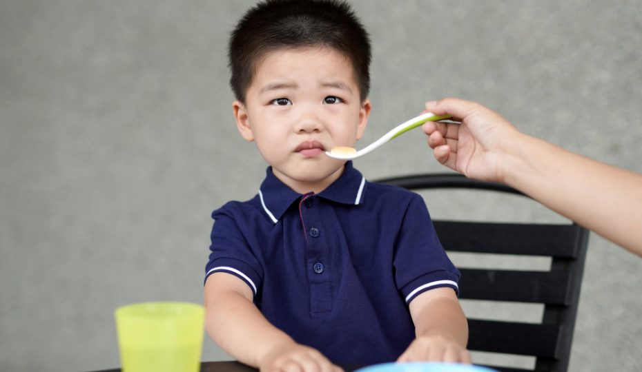 little boy refusing to eat